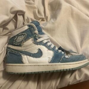 Blue and White High-Top Sneakers Nike Air Jordan 1 High OG
Denim